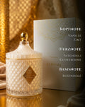 Duftkerze Schiras aus Sojawachs neben edler Geschenkbox mit Duftnoten Vanille, Zimt & Kaffee – Spirit of Persia